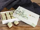 Douceurs_de_fees-12er_Selection_Absinth_Pralinen-farmy-ch-01.webp
